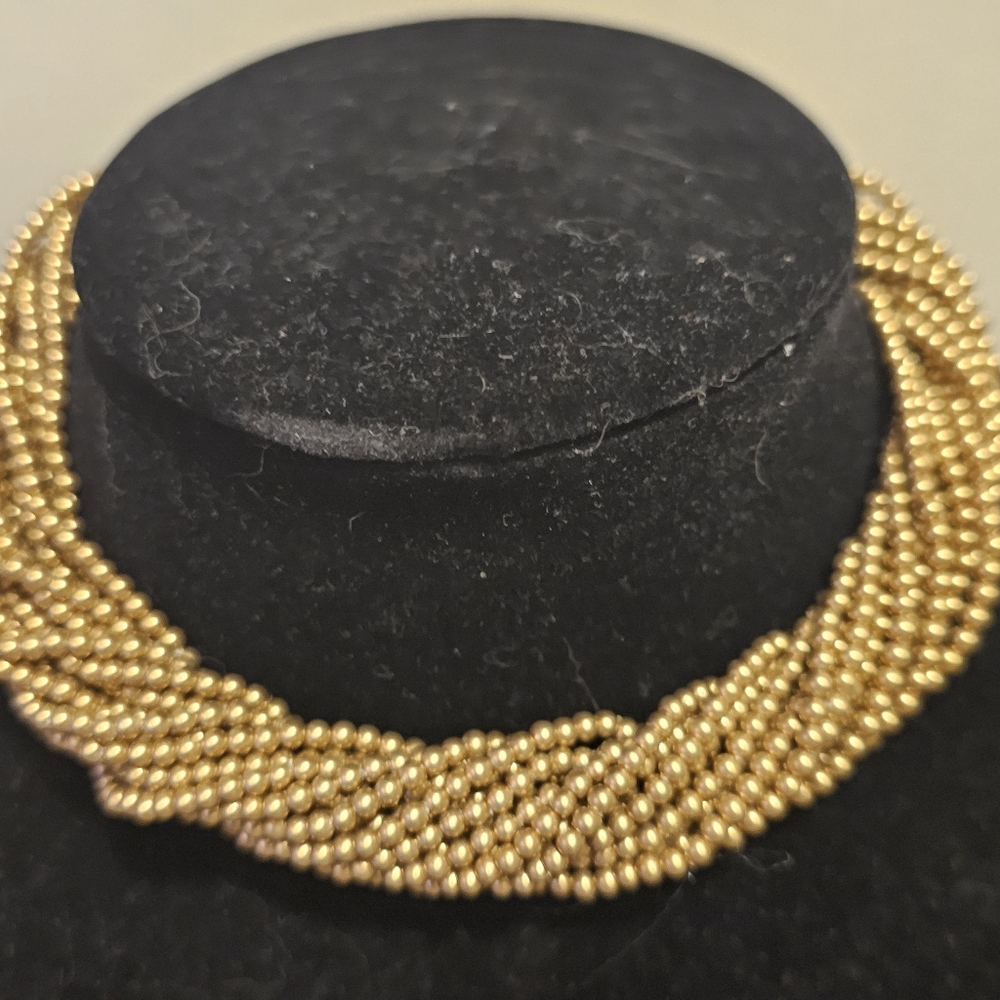 Gold beaded twisted chocker necklace